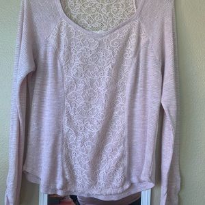 Light pink long sleeve large top . Sparkly middle and lace partial back .